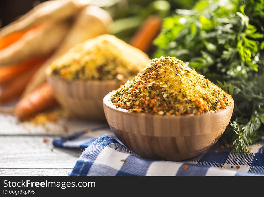 Seasoning spices condiment vegeta from dehydrated carrot parsley celery parsnips and salt with or without glutamate.