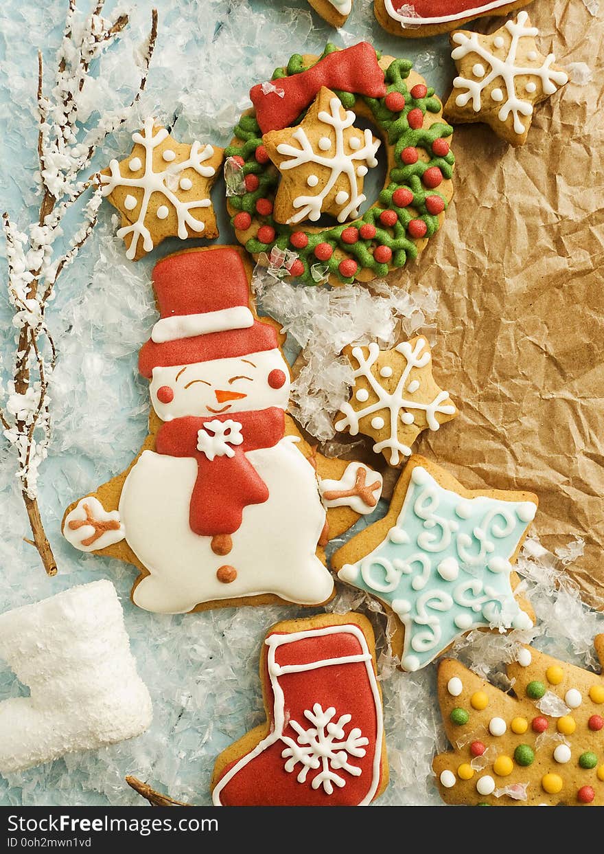 Christmas decorated gingerbread cookies background. Shallow dof. Christmas decorated gingerbread cookies background. Shallow dof