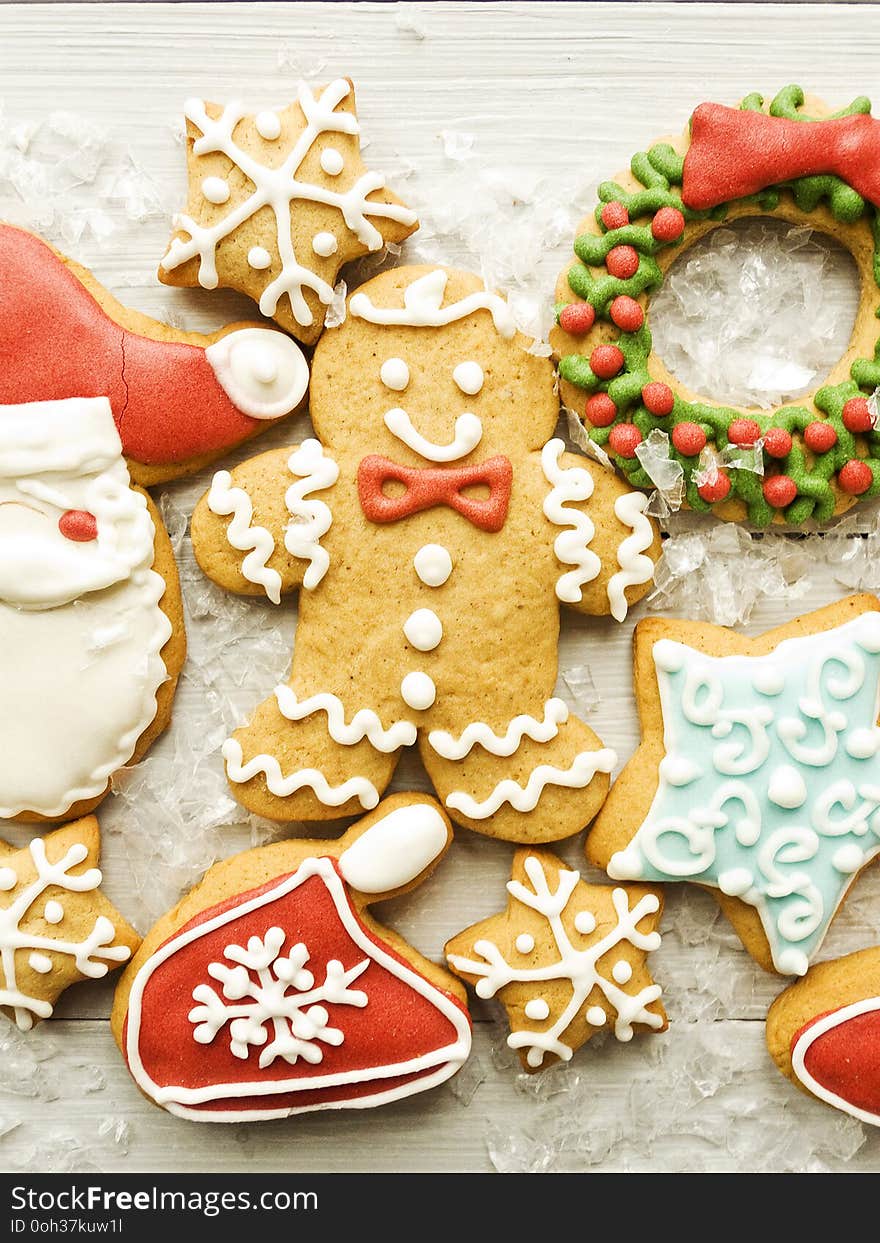 Christmas decorated gingerbread cookies background. Shallow dof. Christmas decorated gingerbread cookies background. Shallow dof