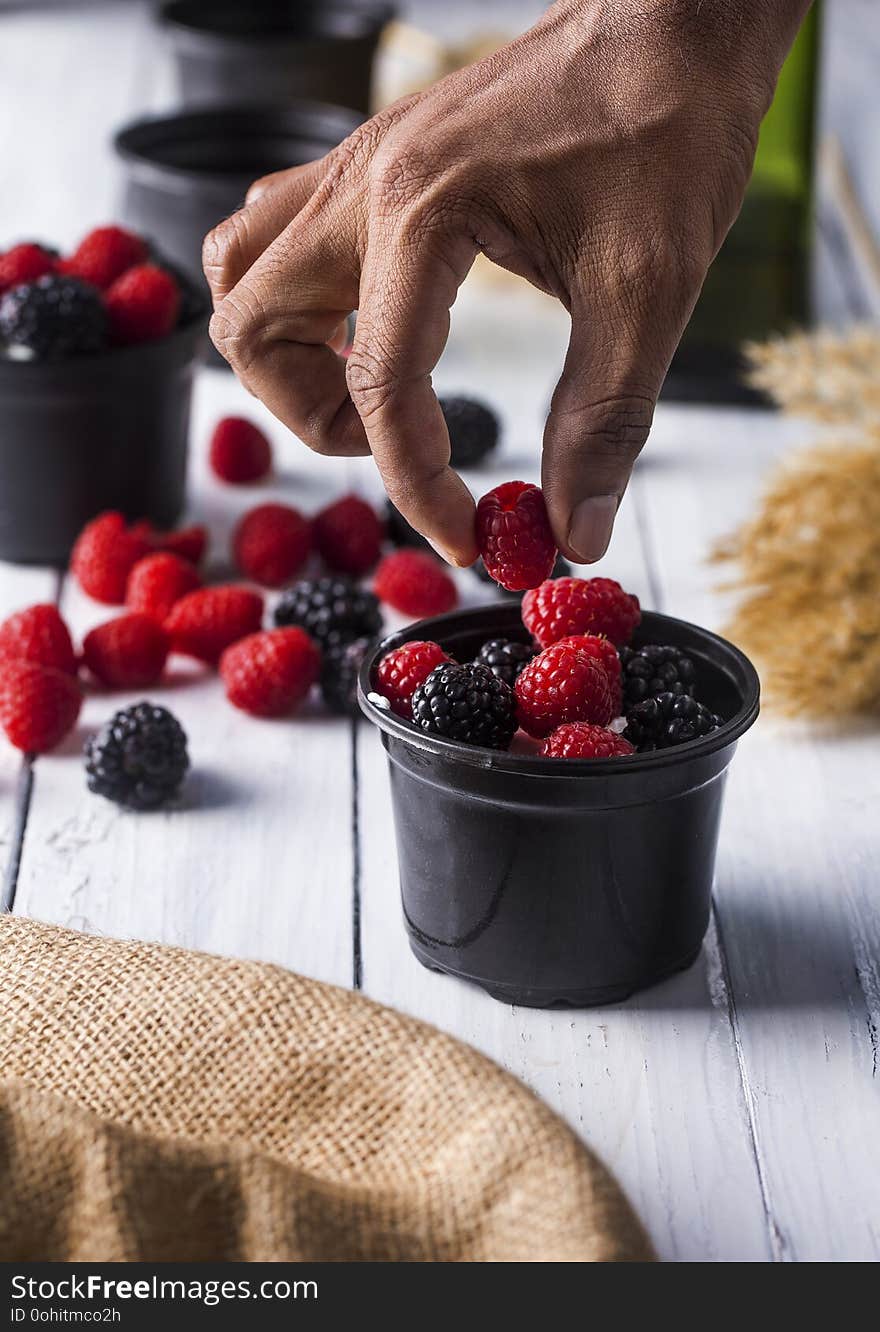 Strawberry raspberry blackberry berry mix fruits on white background berry mix fruits on table