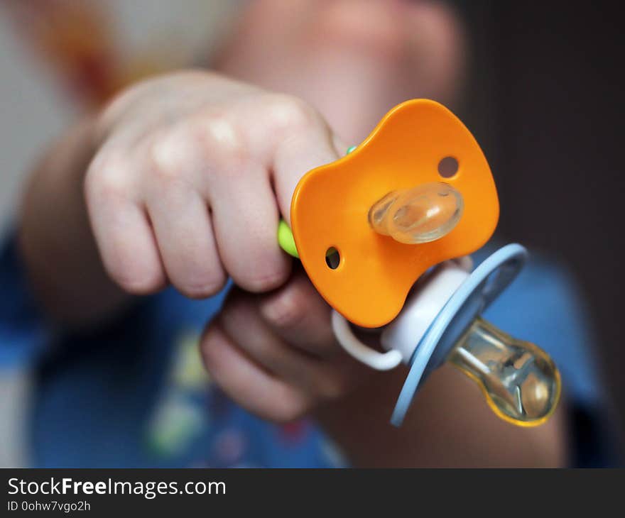 Baby pacifier and baby sleeping, a little boy