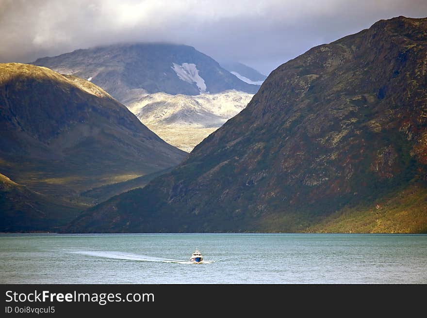 The Passenger boat sailing on the lake in the highlands of Scandinavia