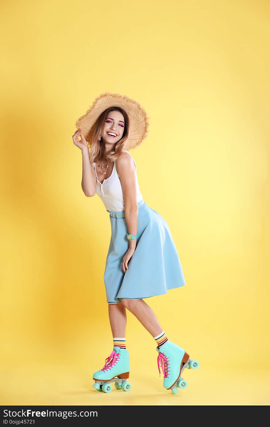 Young woman with retro roller skates