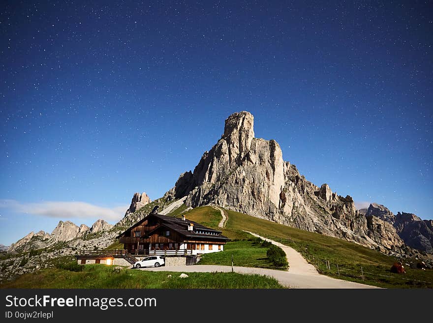 Giau Pass La Gusela mountain at blue hour in the morning. Long exposure shot with stars on sky