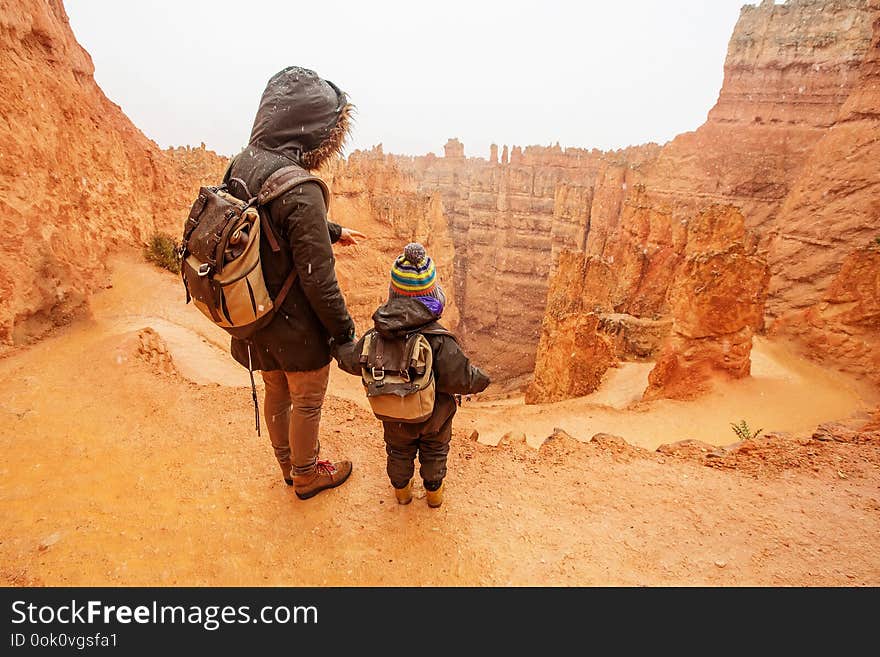 Mother with son are hiking in Bryce canyon National Park, Utah, USA.