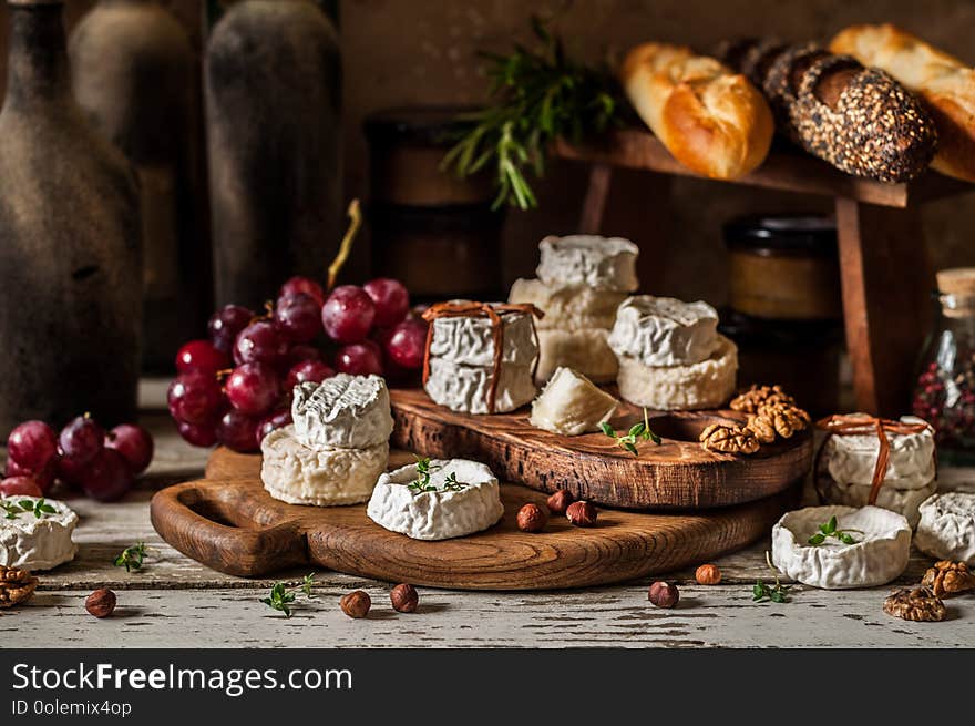 Variety of French Cheeses and Another Provision in a Dusty Pantry. Variety of French Cheeses and Another Provision in a Dusty Pantry