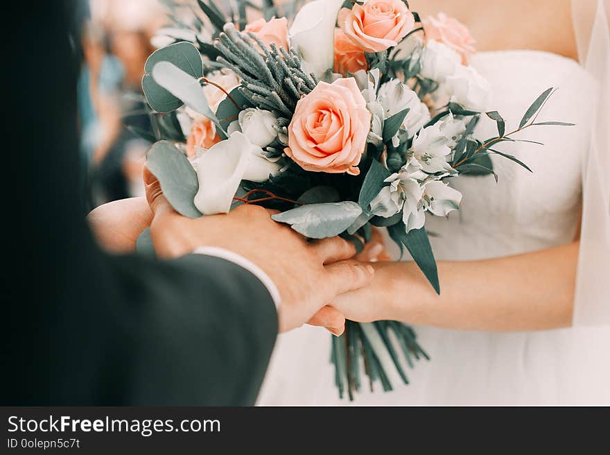 Upper body photo of bride and groom close together. Upper body photo of bride and groom close together