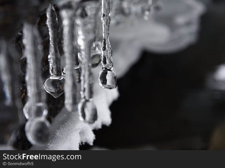 Spring melting of ice. Icicles gallery