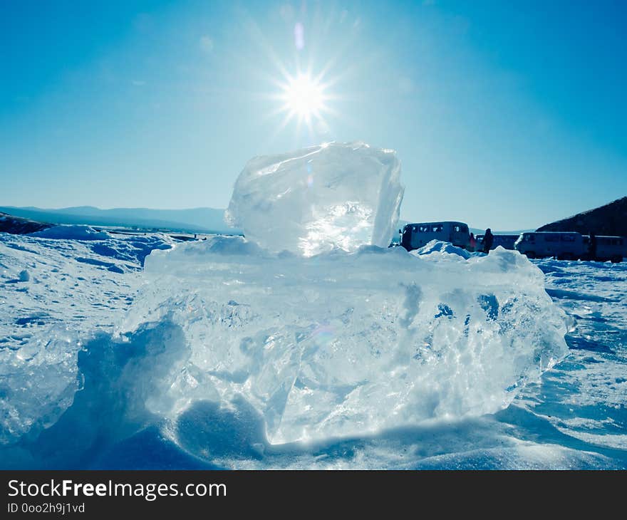 Blocks of ice gleaming in the sun. Arctic winter background. ice texture Lake Baikal, winter Russia