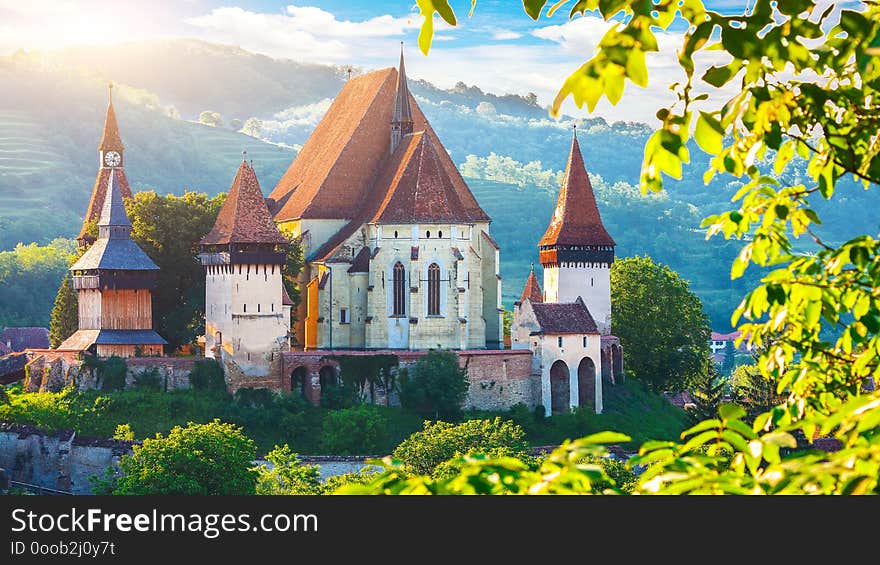 Beautiful medieval architecture of Biertan fortified Saxon church in Romania protected by Unesco World Heritage Site. Amazing sunset in Biertan.Transylvania, Sibiu, Biertan, Romania, Europe