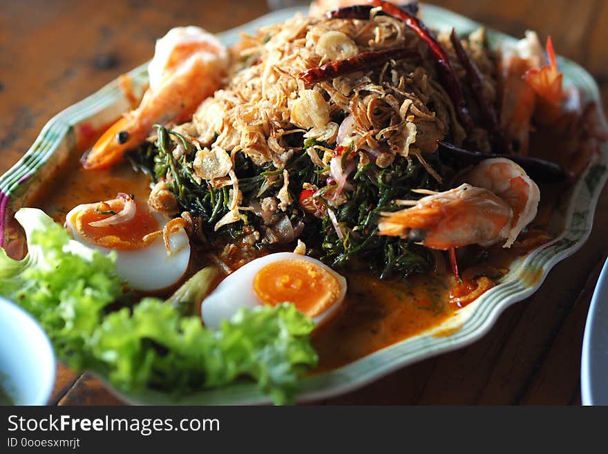 Salad leaves Suaeda maritima and shrimp Thai seafood with boiled egg.