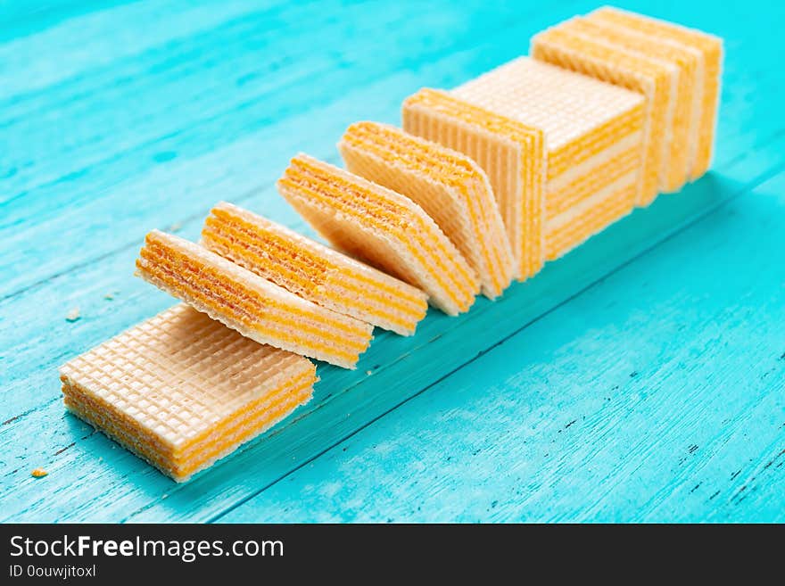 Cheese wafer blocks on blue