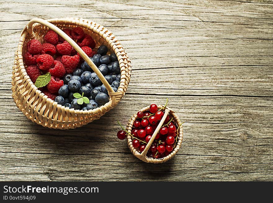 Berries Fruits On Wooden Background