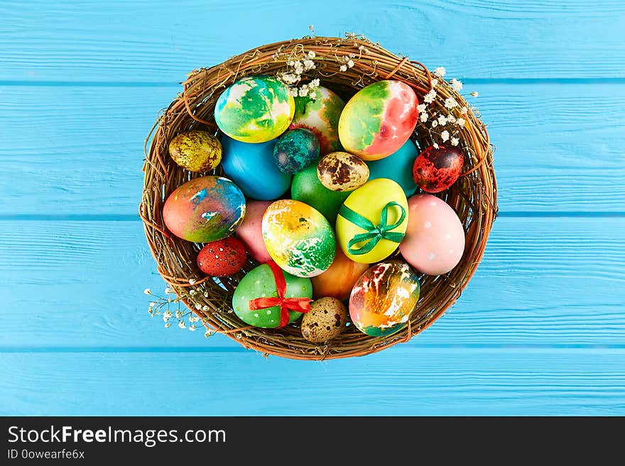 Table setting arrangement in minimal style with easter spring holiday attributes, fork, knife and napkin. Background, copy space, close up, flat lay, top view. Table setting arrangement in minimal style with easter spring holiday attributes, fork, knife and napkin. Background, copy space, close up, flat lay, top view