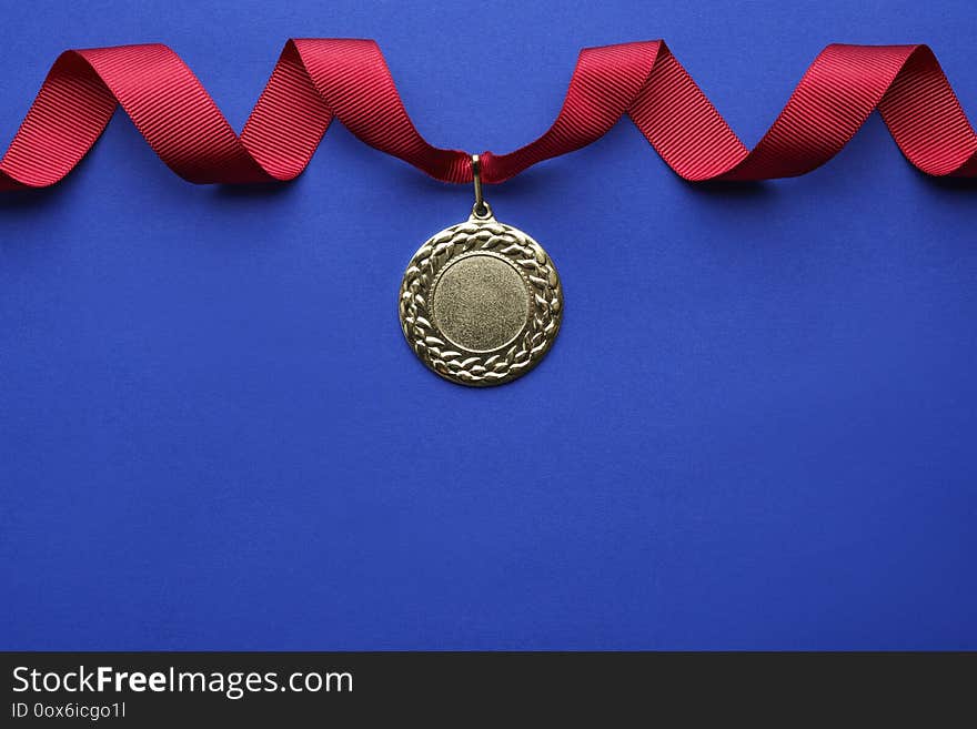 Gold Medal With Space For Design On Color Background