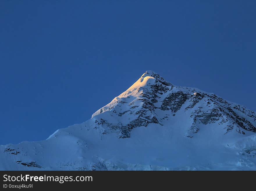 Peak of Bahara Shikhar, mountain of the Annapurna Range in snow