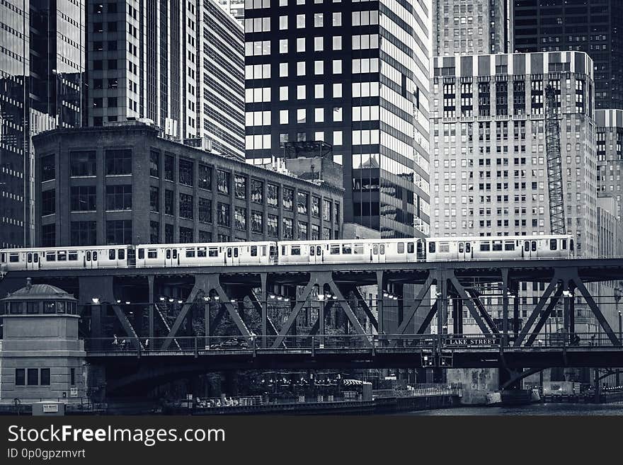 Black and white view of elevated railway train in Chicago