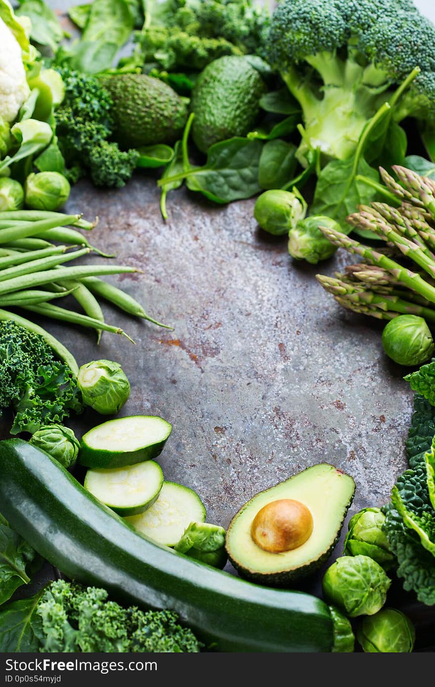 Assortment of healthy organic green vegetables for balanced eating. Vegan, vegetarian, whole food, plant based, clean eating concept. Copy space background. Assortment of healthy organic green vegetables for balanced eating. Vegan, vegetarian, whole food, plant based, clean eating concept. Copy space background