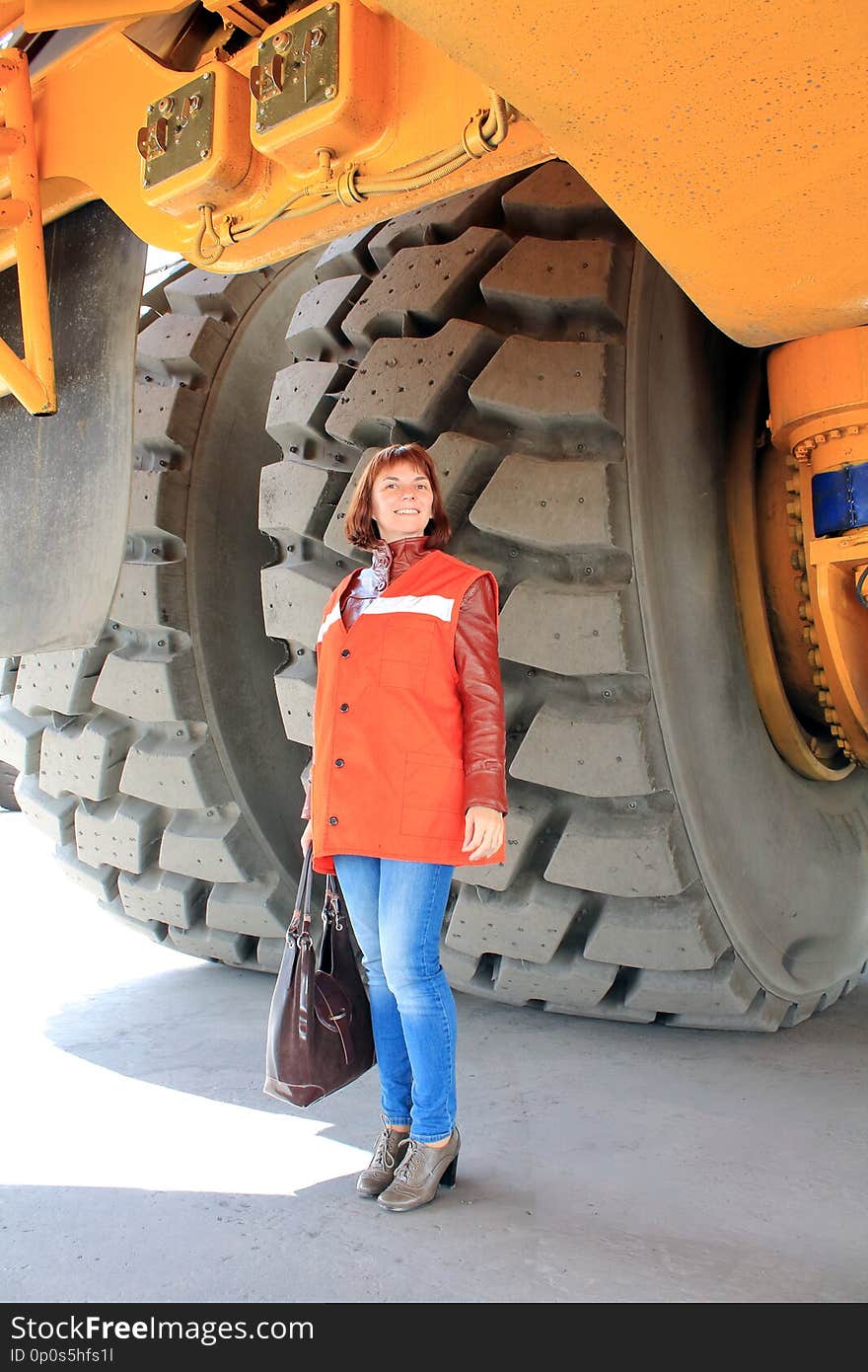 Woman at the big truck. Woman at the big truck