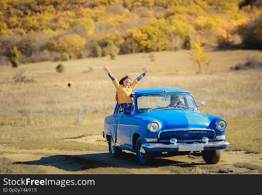 Summer car travel freedom woman in Yosemite National Park with arms raised up cheerful and happy. Summer road trip