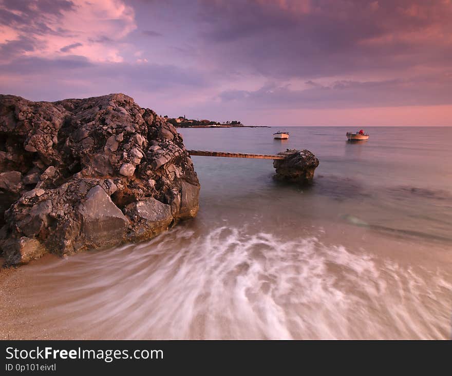 Beautiful sandy beach with rocks