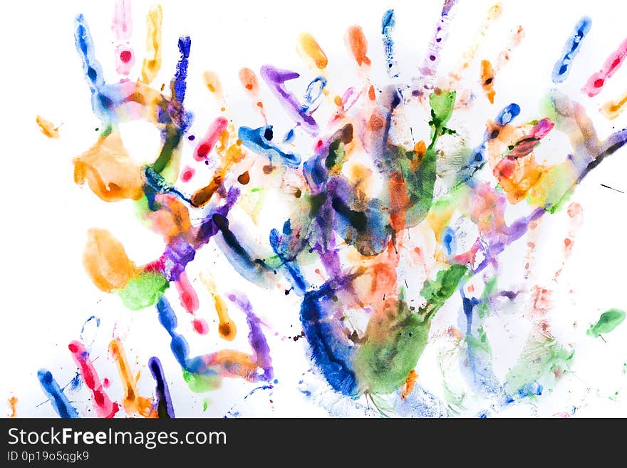 A lot of multicolored hand prints on white background