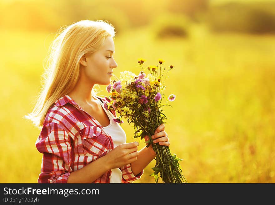 Beautiful Girl With A Bouquet Of Flowers