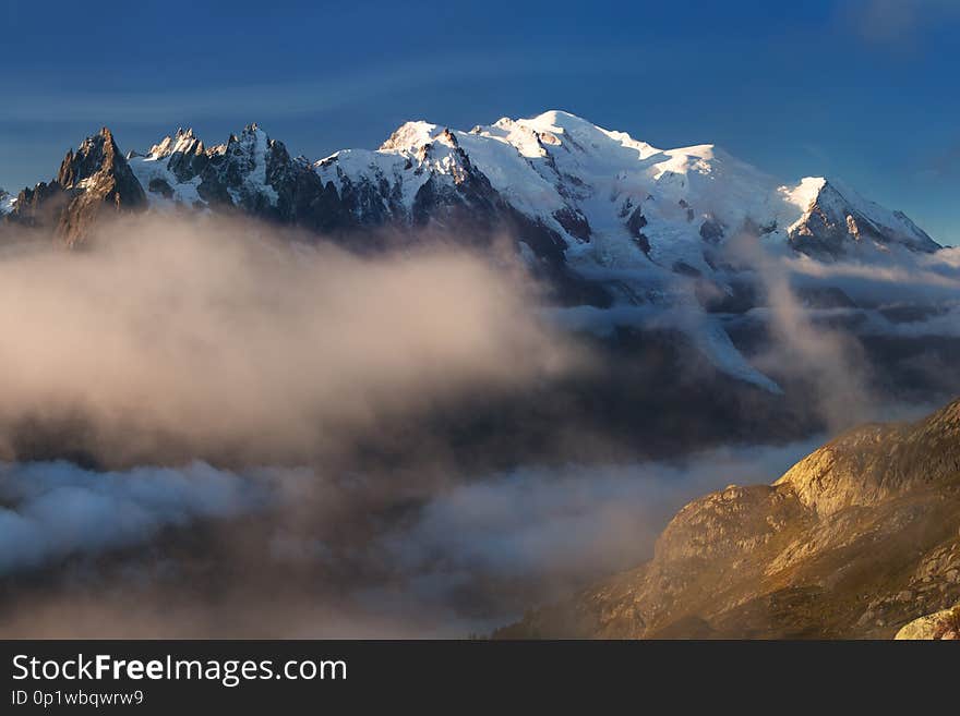 Colorful summer view of the Mont Blanc Monte Bianco on background, Chamonix location. Beautiful outdoor scene in Vallon de Berard Nature Reserve, Aiguilles Rouges, Graian Alps, France, Europe. Colorful summer view of the Mont Blanc Monte Bianco on background, Chamonix location. Beautiful outdoor scene in Vallon de Berard Nature Reserve, Aiguilles Rouges, Graian Alps, France, Europe.