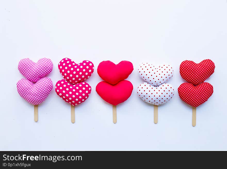 Valentine's hearts on white background. Copy space