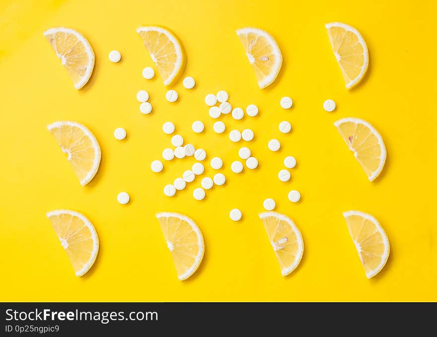 Vitamin C. Slices Of Lemon On A Bright Background And Vitamin C Pills. Beauty Product Branding Mock-up. Top View.