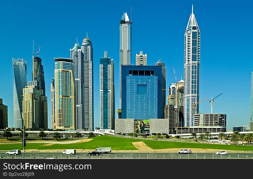 DUBAI, UAE - January 24, 2016: Modern buildings Business Skyscrapers Skyline view of Sheikh Zayed Road, Dubai, UAE. DUBAI, UAE - January 24, 2016: Modern buildings Business Skyscrapers Skyline view of Sheikh Zayed Road, Dubai, UAE