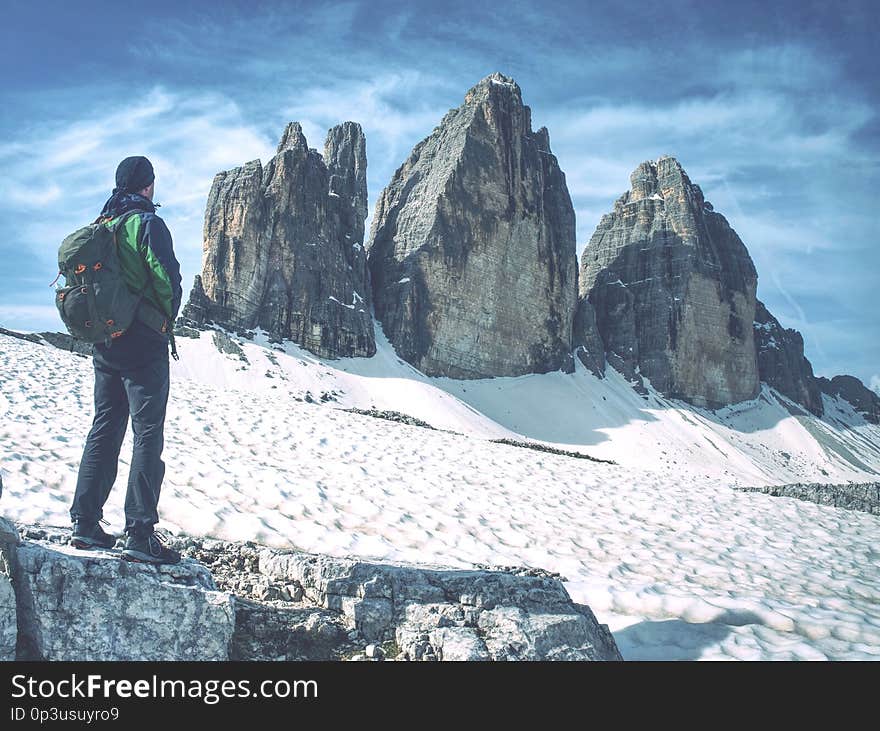 On spring tour around fmous Tre Cime. Great view of alpine Tre Cime di Lavaredo massif way valley tyrol trentino trekking travel tirol summit sudtirol snow sky rock peak overcast outdoor nebulous nature mystic must see mountaineering misty landscape italy hiking high hazy foggy europe drei dramatic dolomiti dolomiten cloudy clouded climbing cliff autumn