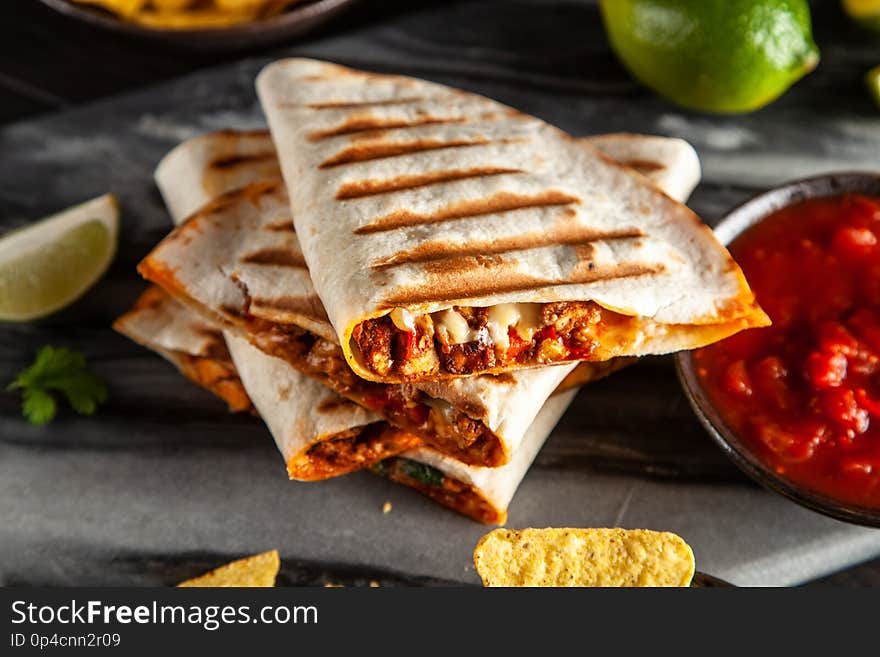 Chicken quesadillas with paprika, cheese and cilantro. Chicken quesadillas with paprika, cheese and cilantro