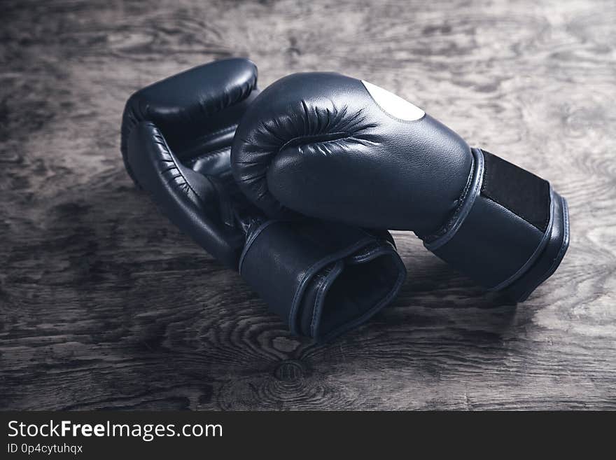 Boxing Gloves On Old Wooden Table