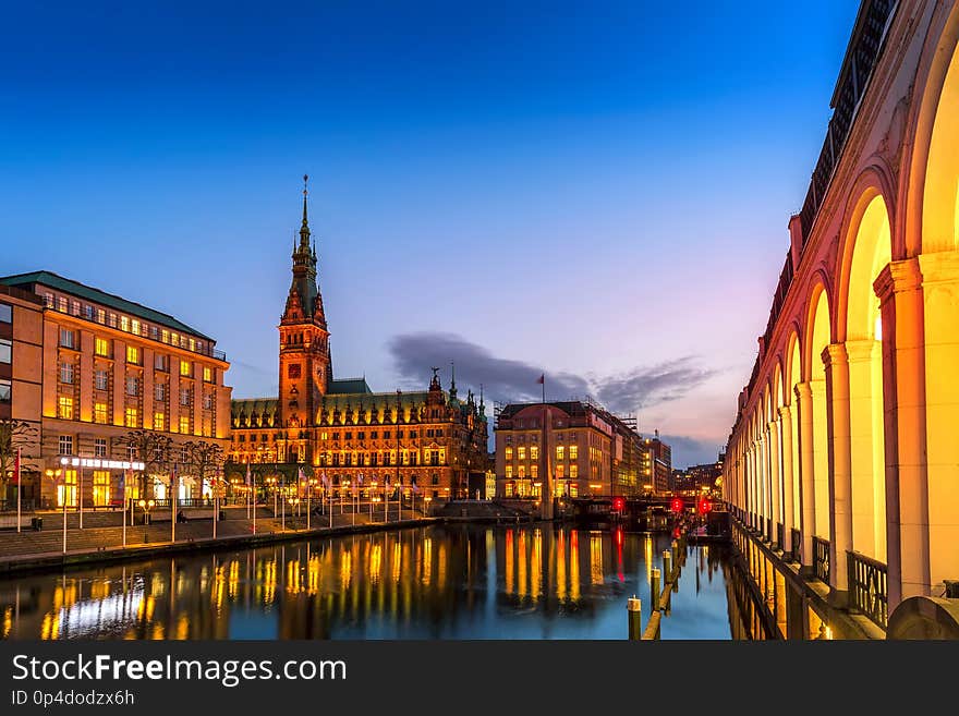 View Of Hamburg Townhall Rathaus And Small Alster Lake During Twilight Sunset