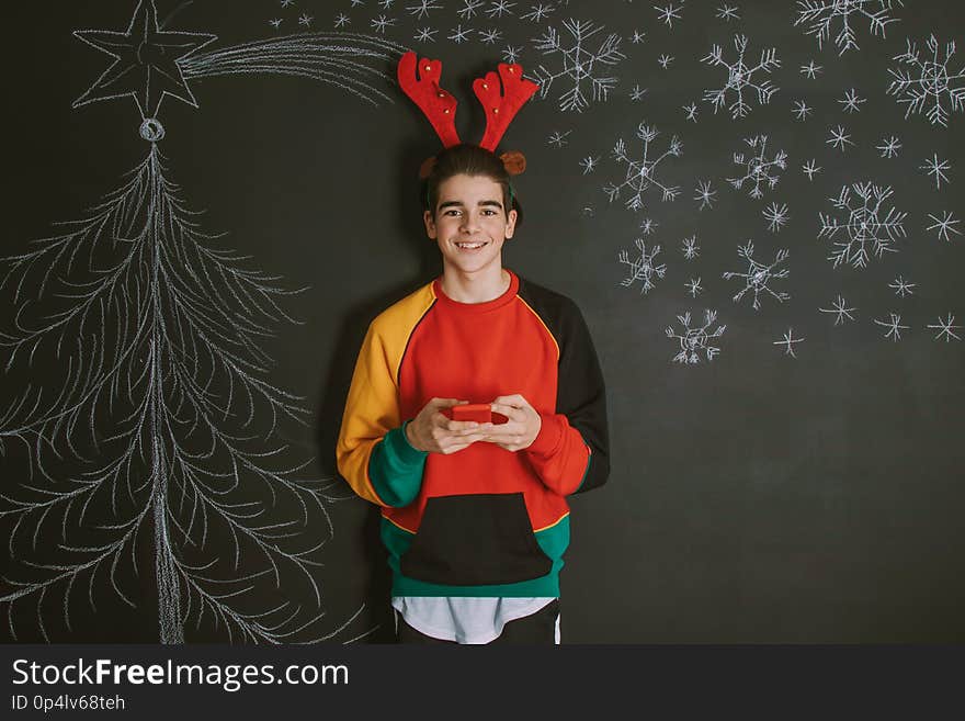 Young drawing and decorating christmas