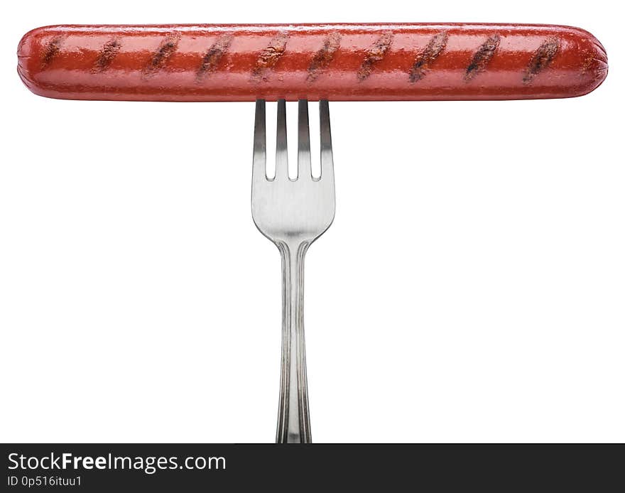 Grilled sausage on a fork. File contains clipping path.