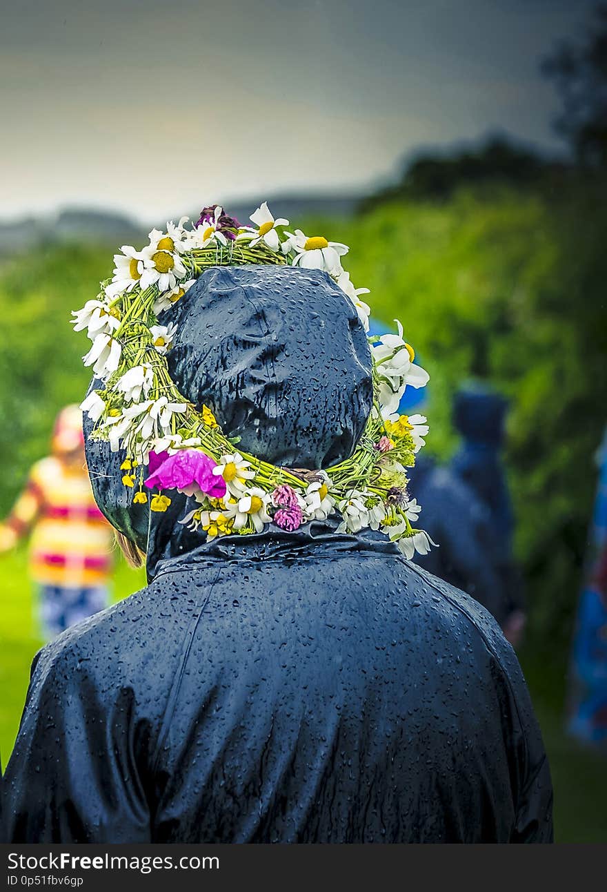 Rainy midsummer with flowers on the head. Rainy midsummer with flowers on the head.