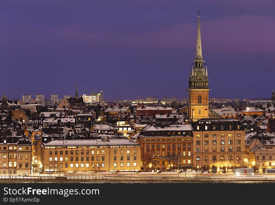 Stockholm Sweden on a winter evening with snow on the rooftops on sunset, Old Town veiw. Stockholm Sweden on a winter evening with snow on the rooftops on sunset, Old Town veiw