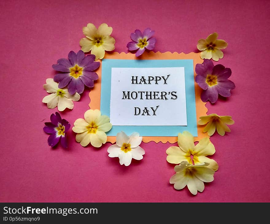 For Mother`s Day holiday the inscription on paper and color flowers