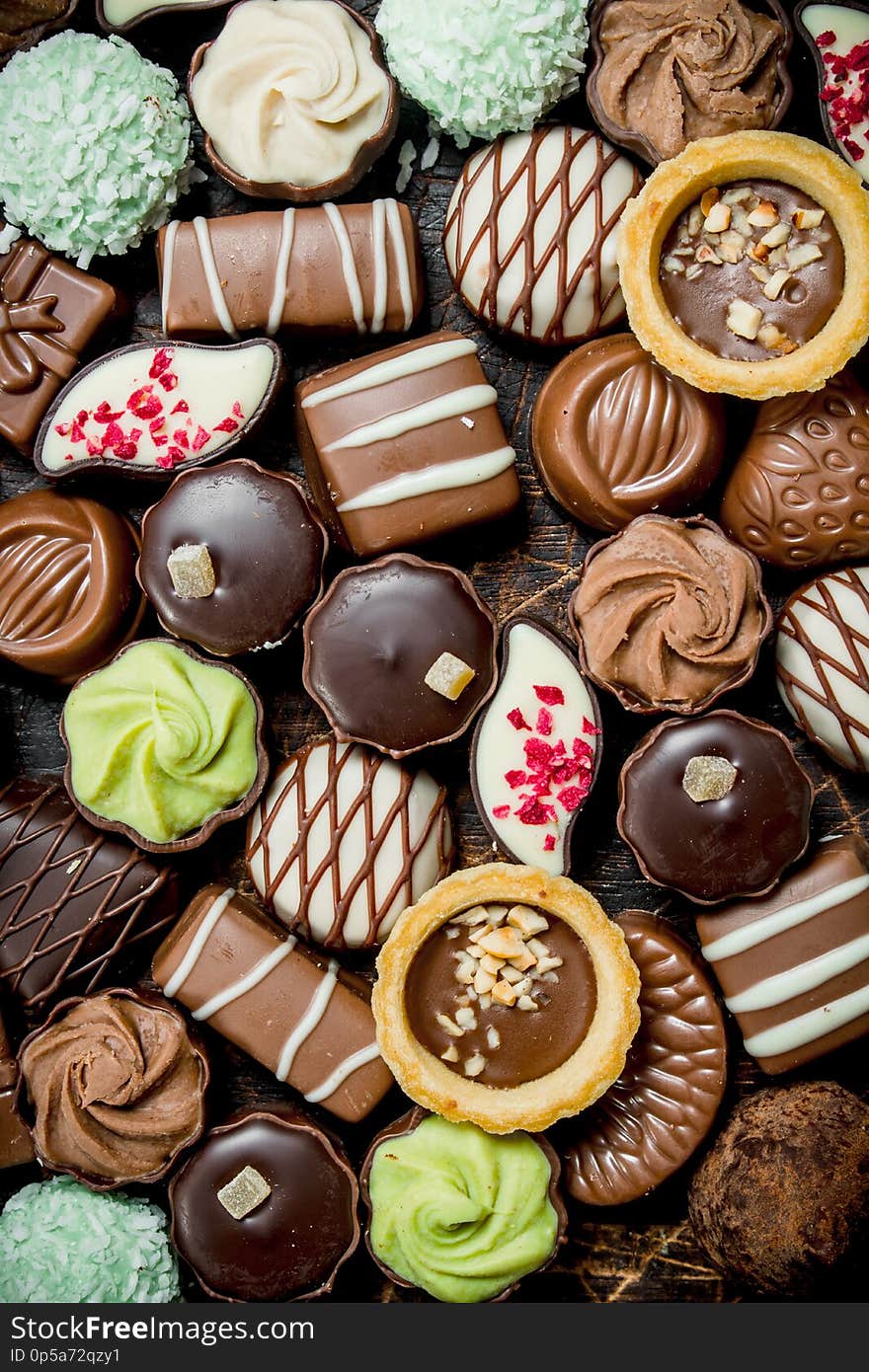 Chocolates candies with different fillings. Top view