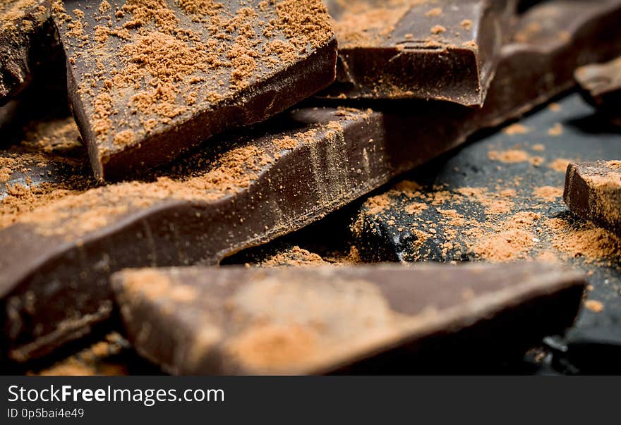 Chocolate slices sprinkled with cocoa powder