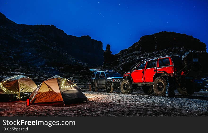 Camping site at night with tents and cars in Utah. Camping site at night with tents and cars in Utah