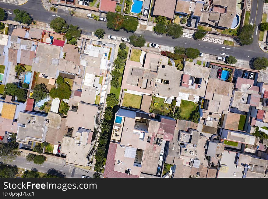 Top view of house`s roofs in La Aurora, Miraflores district. Bird eye of Peruvian residential suburbs.