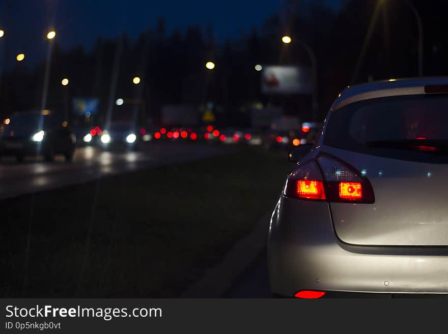 Traffic jam at night in a big city. Blurred Background bokeh