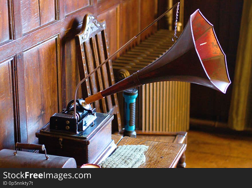 Old phonograph with horn on a table