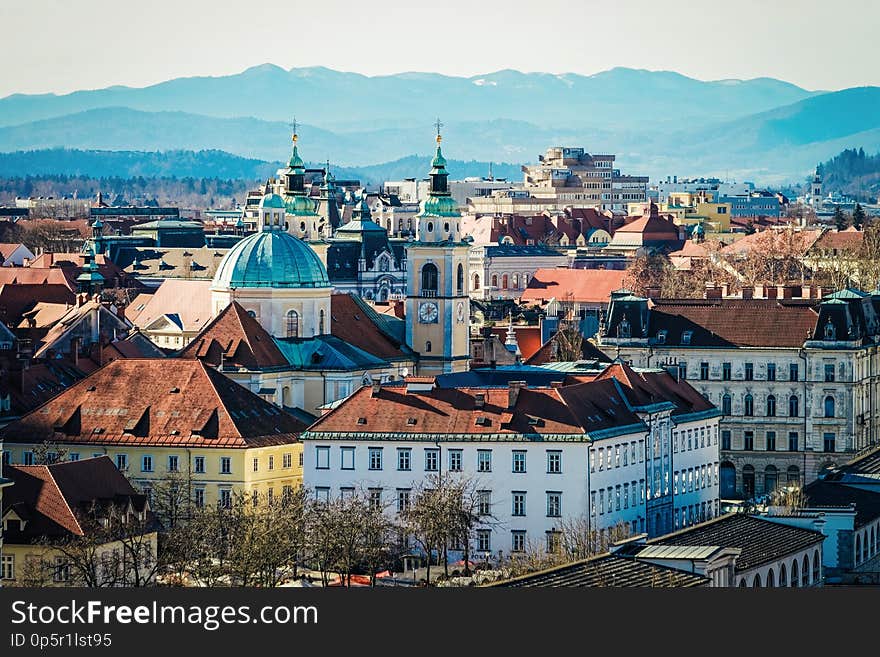 Ljubljana, Slovenia - January 15, 2019: Panoramic view of the cityscape in Ljubljana and mountains in Slovenia. Ljubljana, Slovenia - January 15, 2019: Panoramic view of the cityscape in Ljubljana and mountains in Slovenia