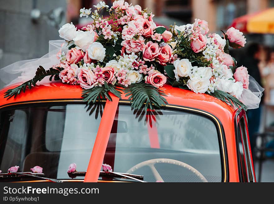 Old Red Car With A Ribbon