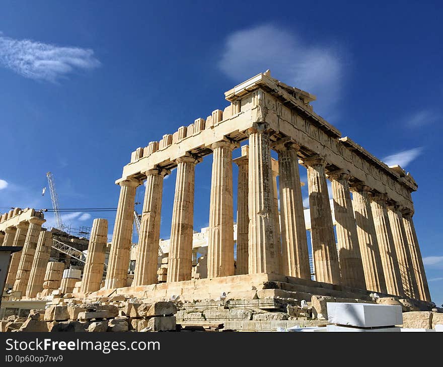 The Acropolis of Athens is an ancient citadel located on a rocky outcrop above the city of Athens and contains the remains of several ancient buildings of great architectural and historic significance, the most famous being the Parthenon. The word acropolis is from the Greek words ἄκρον and πόλις . Although the term acropolis is generic and there are many other acropoleis in Greece, the significance of the Acropolis of Athens is such that it is commonly known as `The Acropolis` without qualification. During ancient times it was known also more properly as Cecropia, after the legendary serpent-man, Cecrops, the first Athenian king. The Acropolis of Athens is an ancient citadel located on a rocky outcrop above the city of Athens and contains the remains of several ancient buildings of great architectural and historic significance, the most famous being the Parthenon. The word acropolis is from the Greek words ἄκρον and πόλις . Although the term acropolis is generic and there are many other acropoleis in Greece, the significance of the Acropolis of Athens is such that it is commonly known as `The Acropolis` without qualification. During ancient times it was known also more properly as Cecropia, after the legendary serpent-man, Cecrops, the first Athenian king.