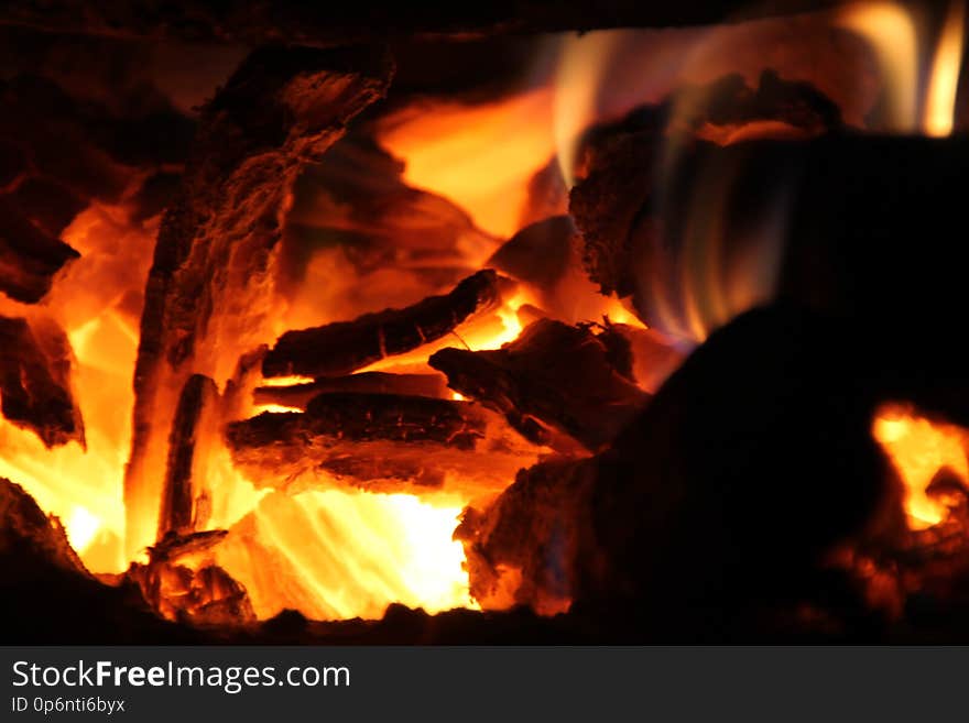 Burning firewood in the stove for cooking,embers,glowing coals